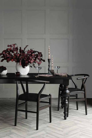 Lifestyle image of the Traditional Black Oak Dining Table