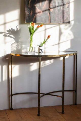 Lifestyle image of the Venetian Mirrored Console Table in the sun