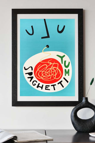 Lifestyle image of the Yum Spaghetti By Fox & Velvet A2 Art Print With Black Wooden Frame