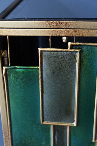 detail image of green panels on Skyline Console Table with gold outline 