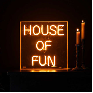 A neon sign saying House Of Fun