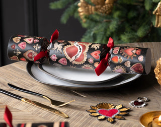 A black and gold themed Christmas tablescape.