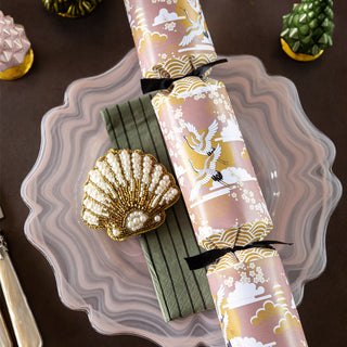 image of Christmas table setting in pink with green and gold accents