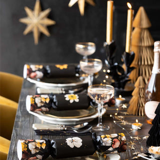 image of Christmas table setting with black and gold accessories