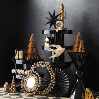 image of Christmas gifts stacked together on side tables. 
