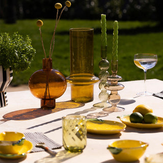 SS22 colour trend tablescape image with orange, yellow and green tableware