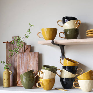 image of colourful mugs on a shelf for stylish kitchen updates