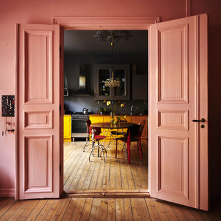 lifestyle image of pink, grey and yellow colourblock kitchen