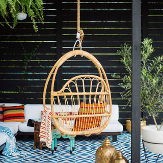 lifestyle image of hanging garden chair