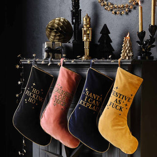 image of stockings styled on the fireplace ready for stocking fillers