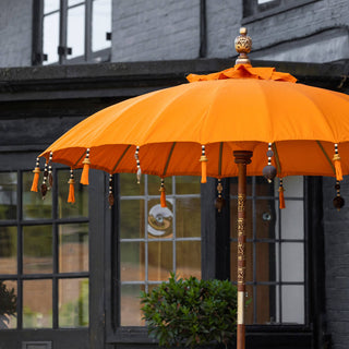 image of vibrant orange garden parasol