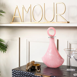 image of wedding gift ideas, including pink art deco decanters and cocktail glasses