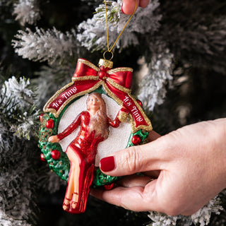 A Mariah Carey Christmas tree decoration with the motif 'It's Time!' styled on a Christmas tree