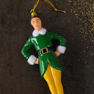 Image of Rockett St George Santas Helper Elf Christmas Decoration on a black background with gold glitter scattered. 
