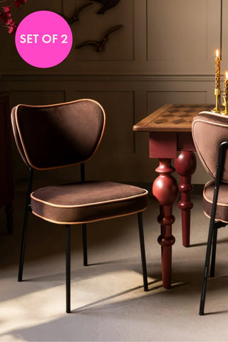 The Set Of 2 Dining Chairs in Chocolate Velvet styled with a dining table and set of 2 badge.
