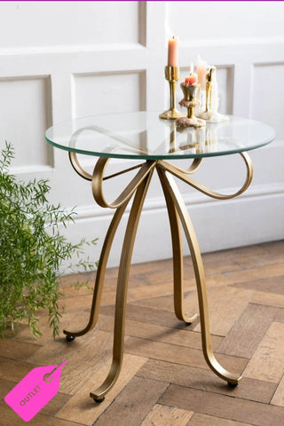 Lifestyle image of The Gold Bow Round Glass Side Table