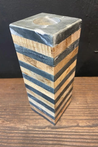 The Wood & Slate Tealight Holder placed on a wooden surface.