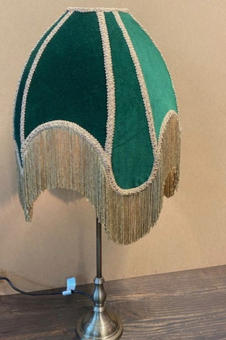 Lifestyle image of the Winifred Green Velvet Fringe Table Lamp.