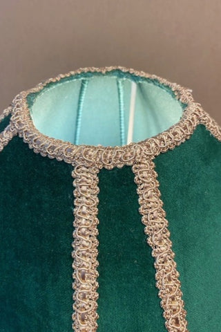 Close up of the top of the Winifred Green Velvet Fringe Table Lamp