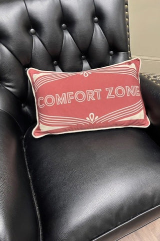 The Heritage Comfort Zone Cushion In Red styled on  black leather chair