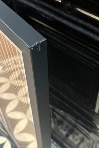 The corner of the Graphic Sunburst Art Print - Framed