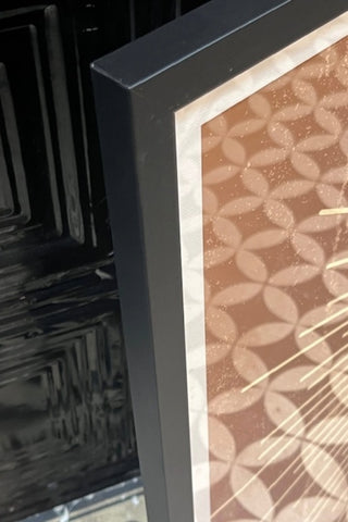The corner of the Graphic Sunburst Art Print - Framed