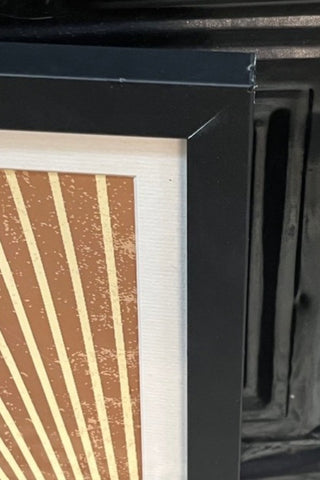 The corner of the Graphic Sunburst Art Print - Framed