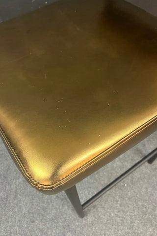 Close up Image of the Burnished Gold Roll Back Bar Stool seat