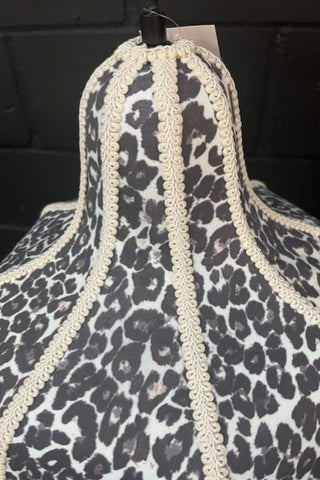 Close-up image of the top of the Monochrome Leopard Print Tassel Edge Ceiling Light