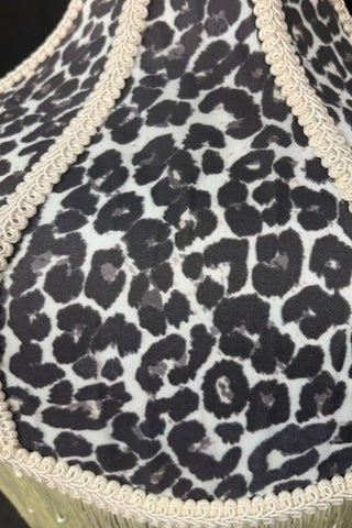 Close-up image of the Monochrome Leopard Print Tassel Edge Ceiling Light