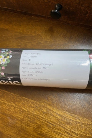 The label on the JoJo & Trixie Floral New York Black Wallpaper