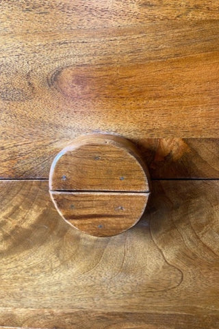 Detail of the drawer of The Brown Wooden Footed Bedside Table.