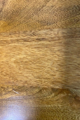 Close up view of the surface of The Brown Wooden Footed Bedside Table.