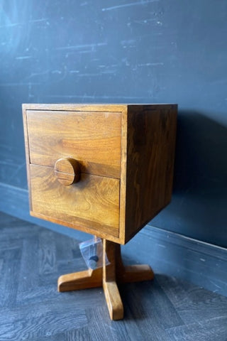 Image of the Brown Wooden Footed Bedside Table on a wooden floor.
