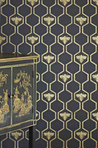 A close up image of Barneby Gates wallpaper that features geometric shapes and honey bees.