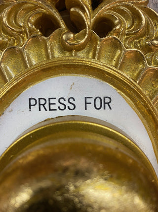 Detail of the lettering on the Press For Champagne Wall Ornament.
