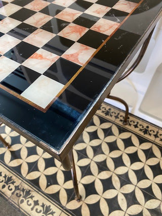 Close up of the corner of  Bronze Effect Chess Side Table.