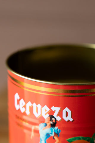 Close-up of the edge of one of the Set Of 2 Flamenco & Orange Kitchen Storage Tins.