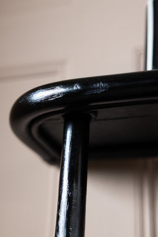 Image of the finish on the Vintage-Inspired Black Rattan Wall Shelf