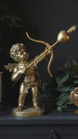 A video of the Gold Cupid Table Lamp being switched on.