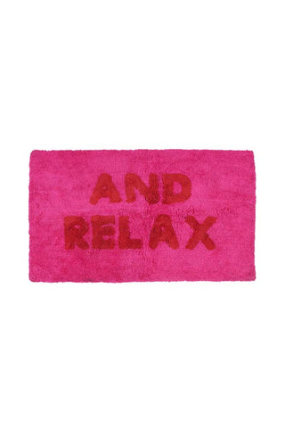Image of the And Relax Hot Pink Tufted Bath Mat on a white background