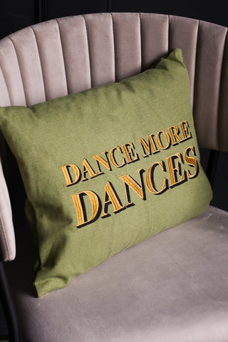 Dance more dances cushion on a mink dining chair