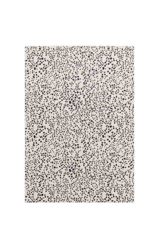 Image of the Muse Monochrome Dalmatian Spot Rug  - 2 Sizes Available on a white background