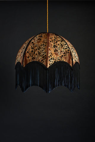 Sexy leopard print pendant ceiling lampshade with extra long black fringing on the bottom.