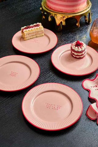 Lifestyle image of the Pink & Red First Bite Side Plates Set of 4