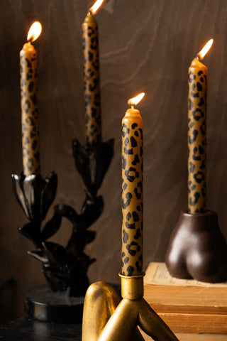Image of the Set Of 4 Leopard Print Dinner Candles lit