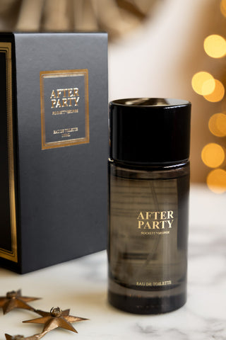 The After Party Eau de Toilette - 100ml on a white surface with the box in the background.