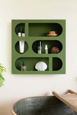 Lifestyle image of the Alcove Wall Shelf in Cactus Green in a bathroom