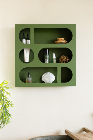 Lifestyle image of the Alcove Wall Shelf in Cactus Green