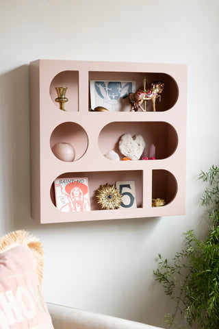 Lifestyle image of the Alcove Wall Shelf in Dusty Pink